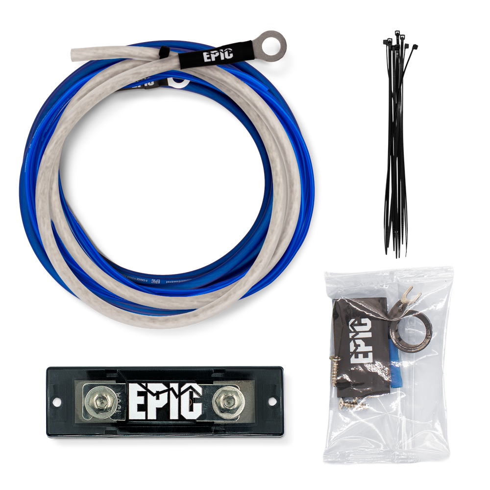 Epic brand cable kit on a white background, including a coiled blue and white cable with a ring terminal, a black rectangular battery terminal block with EPIC branding, a clear plastic bag with zip ties and small hardware, and a bundle of black zip ties.