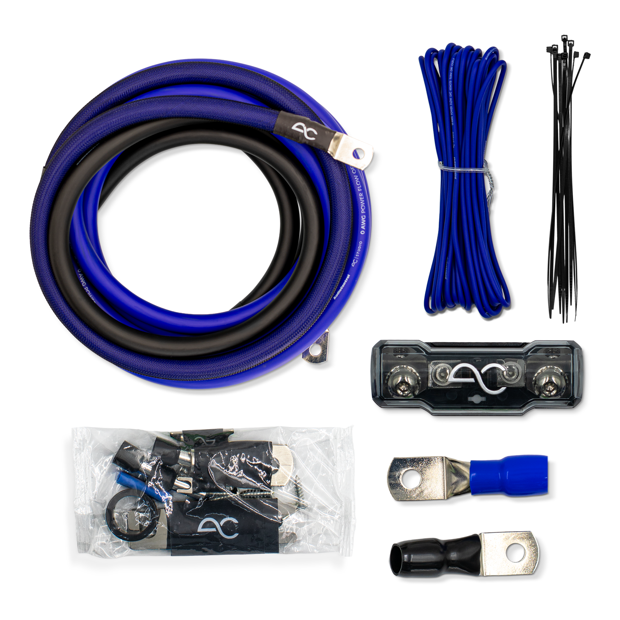 A multi-piece audio power cable kit laid out on a white background, including a coiled blue and black cable, blue wire, black zip ties, a black terminal block, ring splices, and a small accessory package with a branded pouch.
