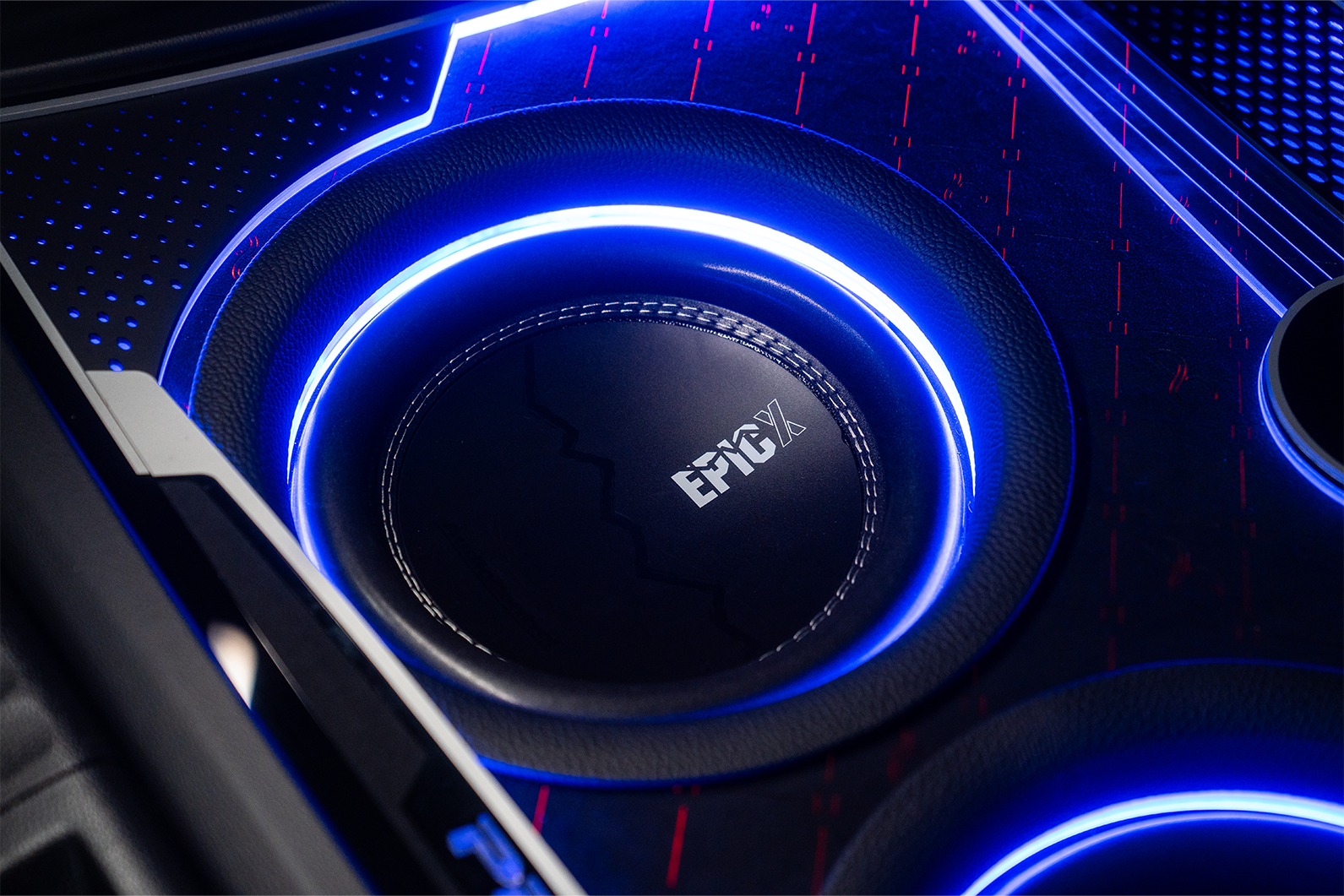 Car subwoofer with blue lighting and 'EpicX' branding