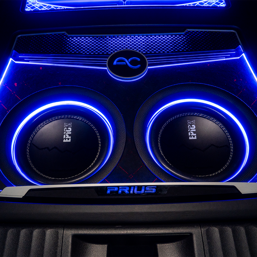 Car audio system with blue lighting and 'EPIC' branding on a dark background